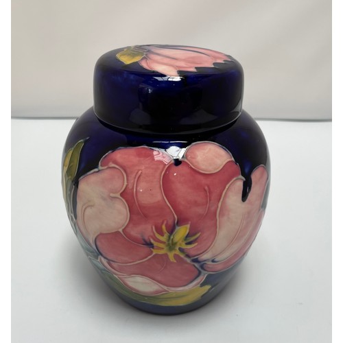 28 - A Moorcroft Pottery ginger jar and cover, in the Magnolia pattern, with impressed and painted factor... 