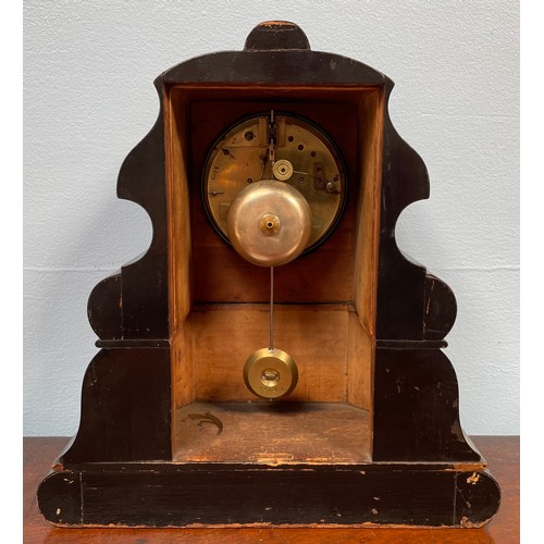 450 - A 19th century black lacquered mantel clock, scalloped shaped case with floral brass, mother of pear... 