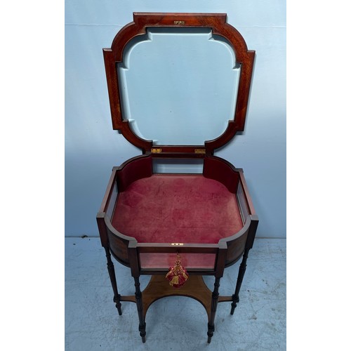 584 - A stained walnut bijouterie table with shaped top, inlaid floral canted corners, red velvet lined in... 