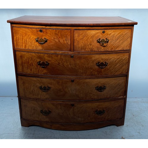 582 - A 19th century mahogany bow-front chest of two short and three long flamed graduated drawers with br... 