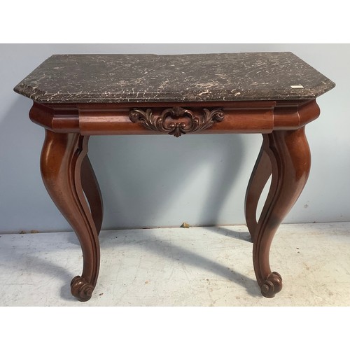 572 - A marble topped console table with carved and pulvinated frieze drawer, raised on thick cabriole sup... 