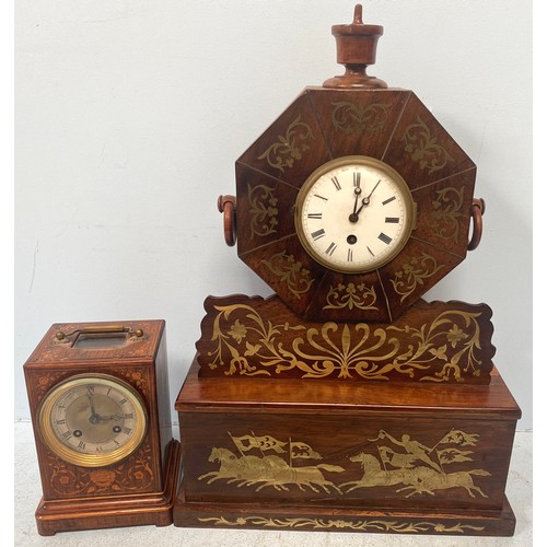 451 - A hexagonal clock with two-tier stepped base, inlaid with brass flowers, foliage and charging horses... 