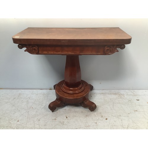 571 - An early Victorian stained mahogany folding card table, of rectangular form, the top enclosing a gre... 