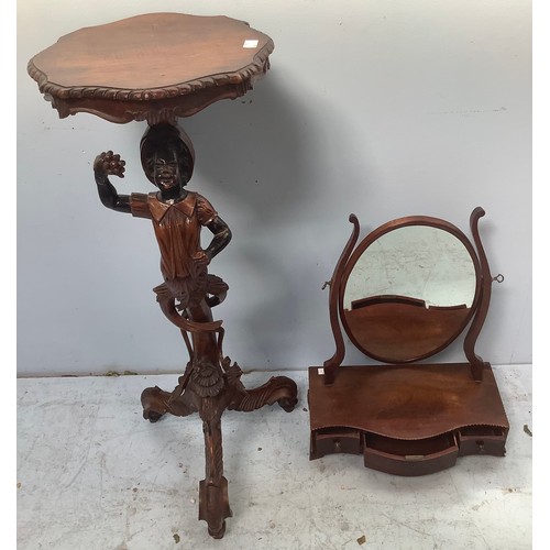 546 - A carved wooden blackamoor style jardiniere stand, with young man holding aloft a bunch of grapes, r... 