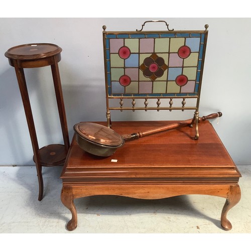 603 - A mahogany coffee table raised on cabriole supports, 95cm wide, together with a brass fire guard wit... 