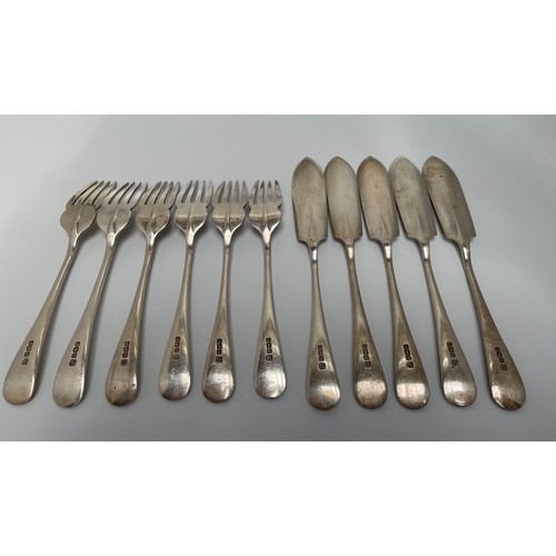 100 - A silver part fish knife and fork set comprising five knives and six forks, Sheffield, 1914, makers ... 