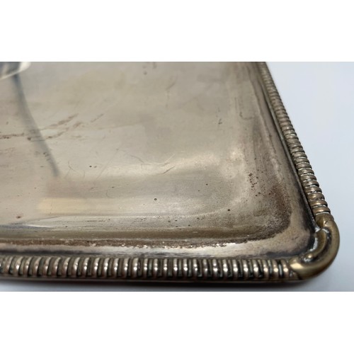 104 - A white metal rectangular tray with reeded edge, marked 900, 13.10 ozt, 20 x 22cm