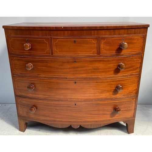 607 - An Edwardian inlaid mahogany bow-front chest of three short over three long graduated drawers with t... 