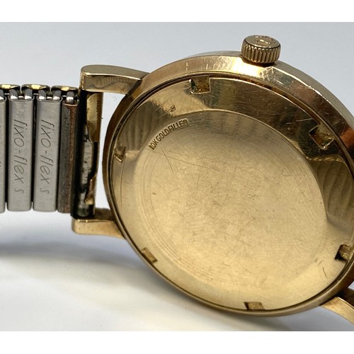 141 - A gents 10k gold filled Omega automatic wristwatch, the gold linen dial with applied gilt batons den... 