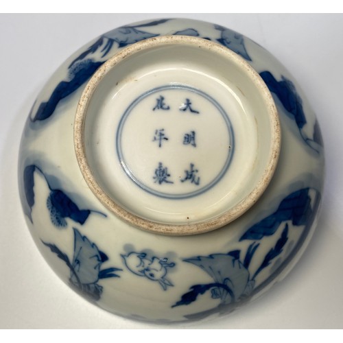 66 - A Chinese porcelain blue and white bowl decorated with ladies in a walled garden with a rabbit, Chen... 