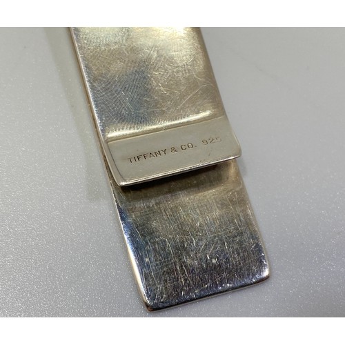 86 - A sterling silver money clip by Tiffany & Co. Hallmarked London, 2000, 6cm long, gross weight approx... 