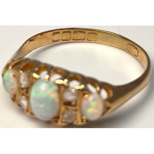 228 - An 18ct gold, Opal and rose-cut diamond ring, 3.0g, ring size 'S'