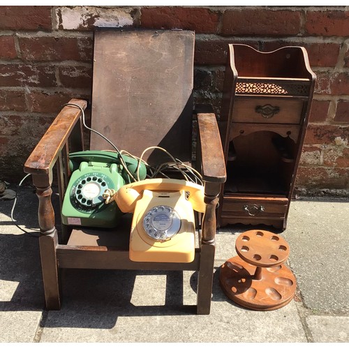 363 - Two vintage telephones in yellow and green, together with a Decatur Industries pipe stand and a wall... 