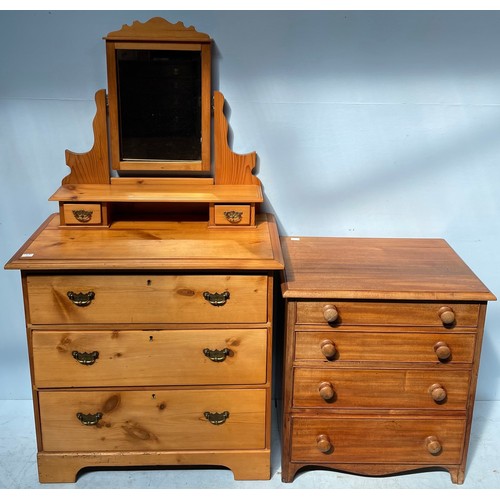 550 - A pine dressing table with mirrored back above a chest of three graduated long drawers, raised on sh... 