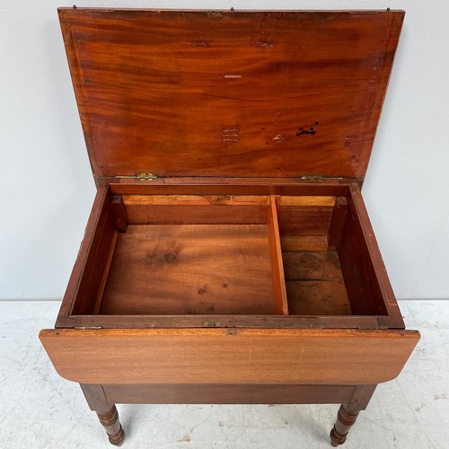 552 - An unusual 19th century and later mahogany campaign style Pembroke table, with hinged top enclosing ... 