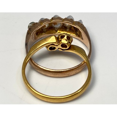 221 - An 18ct white and yellow gold crossover ring, with two small illusion set diamonds, gross weight app... 