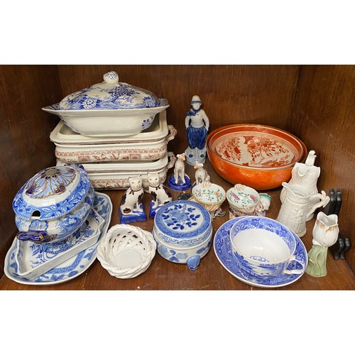 38 - Three shelves of mixed ceramics including a Chinese famille rose bowl with Jiaqing mark to base, blu... 