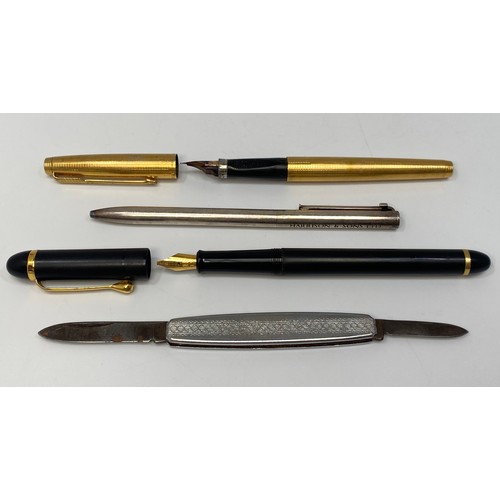 393 - A Parker 65 fountain pen with 14ct gold plated cap and barrel and 14ct gold nib, together with a Tif... 