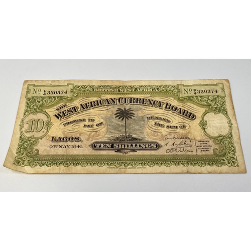 397 - A West African Board 10 shilling note ‘Lagos 9th May 1941’ serial no. F4/330374, central palm tree a... 