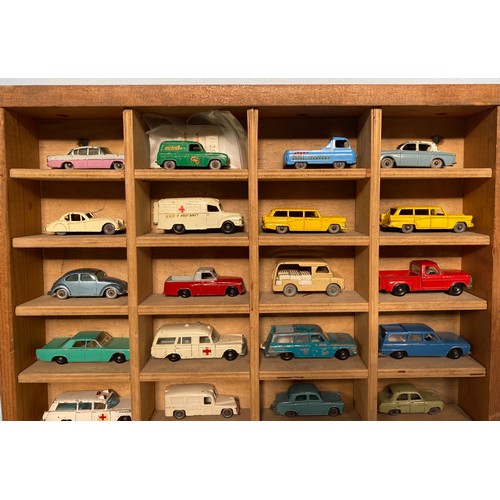 427 - A collection of 32 loose play worn die-cast model vehicles, housed in wooden display case, examples ... 