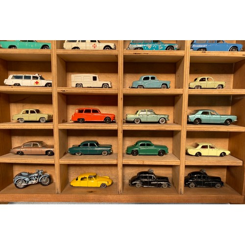 427 - A collection of 32 loose play worn die-cast model vehicles, housed in wooden display case, examples ... 