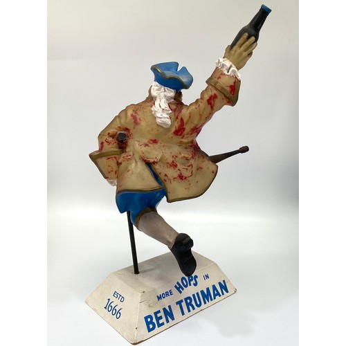 340 - An advertising bar ornament for Ben Truman, modelled as a jumping peg-leg pirate, celluloid figure o... 