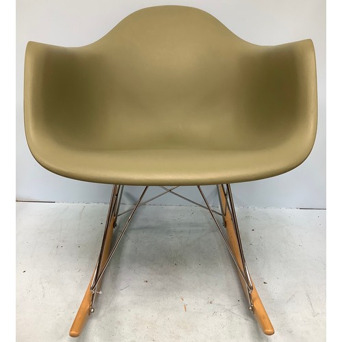 544 - After Charles & Ray Eames for Herman Miller, a modern copy of an RAR (Rocking Armchair Rod Base) roc... 