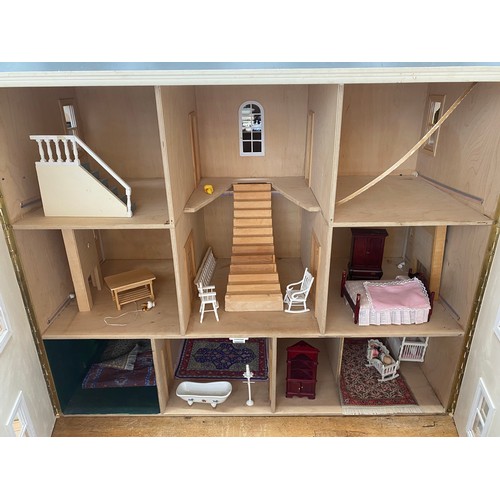 446 - A large Georgian style dolls house over four floors plus a roof terrace, 110cm high x 98cm wide, tog... 