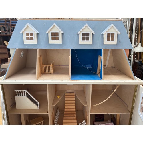 446 - A large Georgian style dolls house over four floors plus a roof terrace, 110cm high x 98cm wide, tog... 