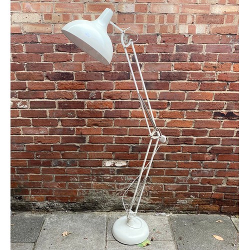 462 - A floor standing white metal Anglepoise style lamp raised on circular base, approx. 200cm high