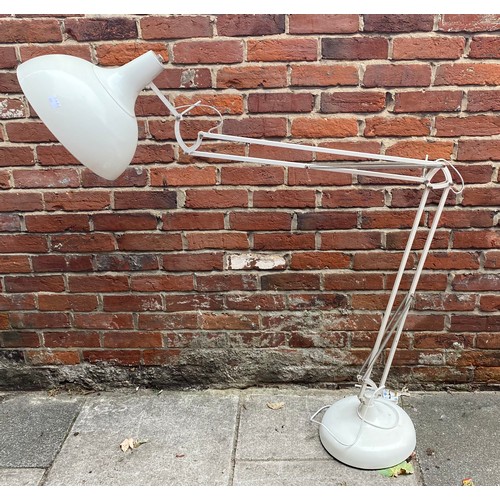 462 - A floor standing white metal Anglepoise style lamp raised on circular base, approx. 200cm high