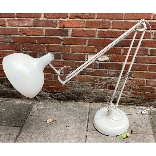 462 - A floor standing white metal Anglepoise style lamp raised on circular base, approx. 200cm high