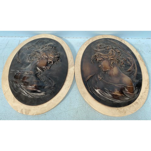 539 - After Louis Alexandre Bottee (French, 1852-1940) A pair of bronze oval plaques depicting portraits o... 