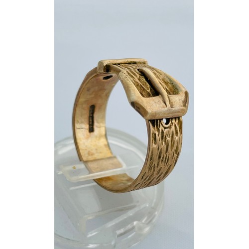 205 - A 9ct gold gents buckle ring, weighing 6.4 grams, finger size T.