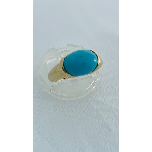 183 - Two 9ct gold dress rings, one set with an oval cabochon turquoise stone, the other set with a rectan... 