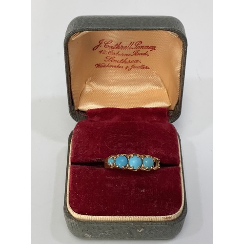 239 - An 18ct gold and turquoise ring, oval graduated turquoise, (one missing), 2.78g