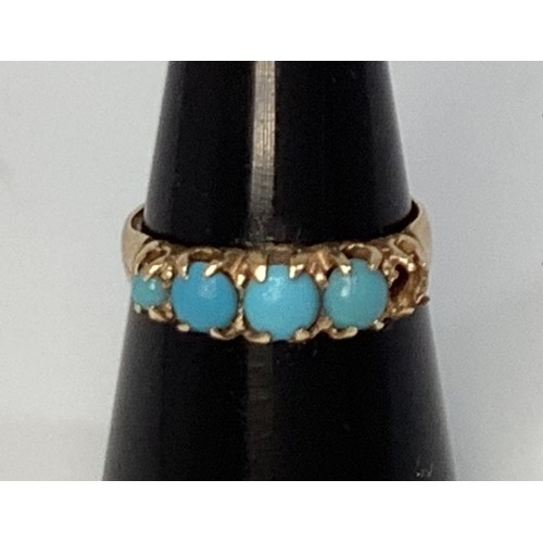 239 - An 18ct gold and turquoise ring, oval graduated turquoise, (one missing), 2.78g