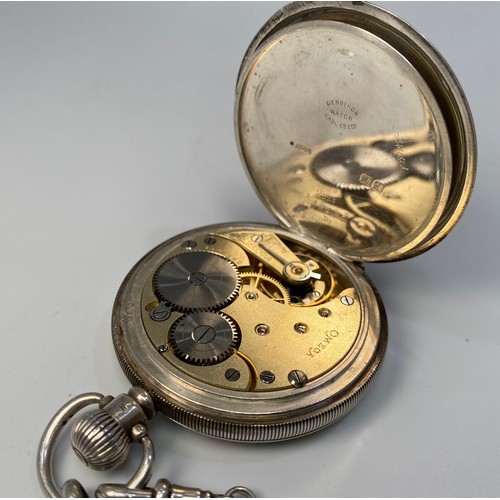 150 - A silver cased, keyless full-hunter pocket watch by Omega, the white enamel dial with Arabic numeral... 