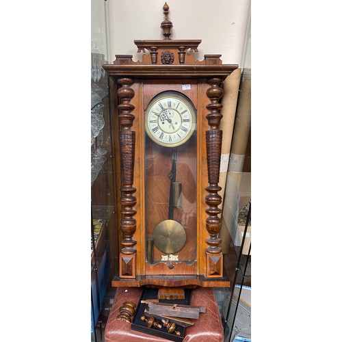 453 - A walnut cased eight-day Vienna wall clock with cream painted dial, interspersed red fleur-de-lis be... 