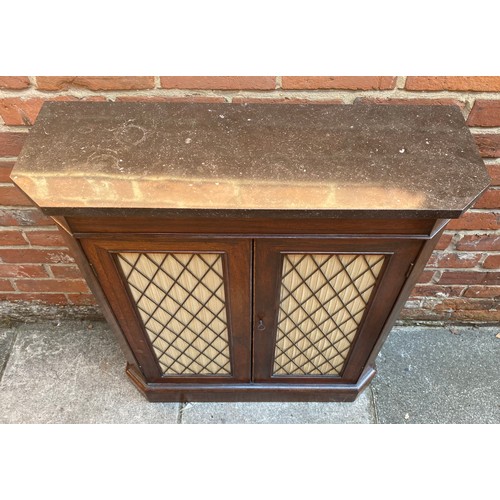 543 - A Regency rosewood two-door sideboard, with marble top, above the doors with cream fabric lining and... 