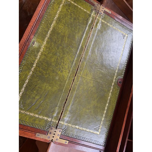 399 - A brass bound mahogany campaign writing slope with double fold- out green leather gilt tooled scribe... 