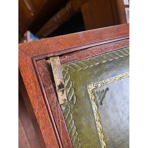 399 - A brass bound mahogany campaign writing slope with double fold- out green leather gilt tooled scribe... 