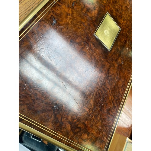 321 - A large Victorian burr walnut writing slope, with brass bound edges and twin flush handles, side dra... 