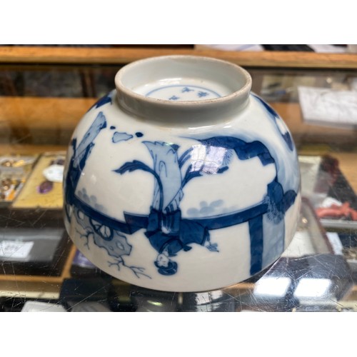 66 - A Chinese porcelain blue and white bowl decorated with ladies in a walled garden with a rabbit, Chen... 