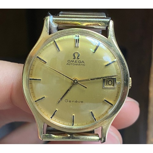 131 - A gents 9ct gold Omega Automatic Geneve, the gilt dial with applied gold batons denoting hours and d... 