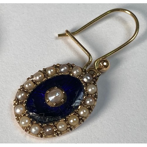 201 - A pair of 15ct gold oval shaped drop earrings, set with seed pearls and blue enamel, on 9ct gold wir... 