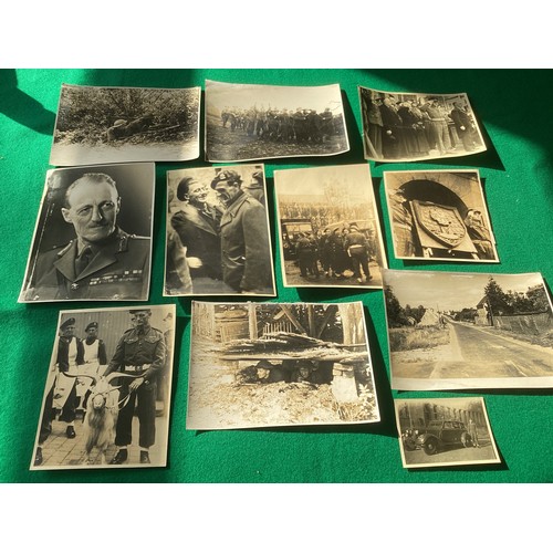 164 - Probably a unique collection of approximately 60 World War Two photographs of various sizes, which s... 