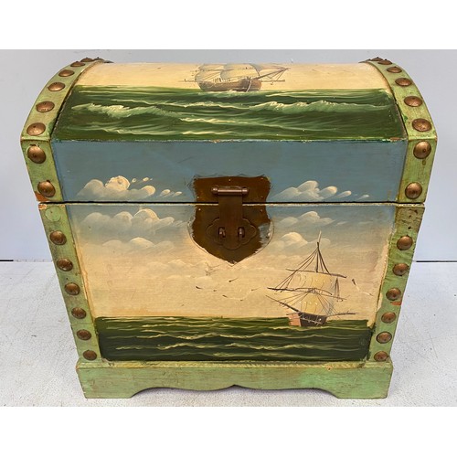 494 - A dome-top wooden chest painted to the top and front with a ship in full sail