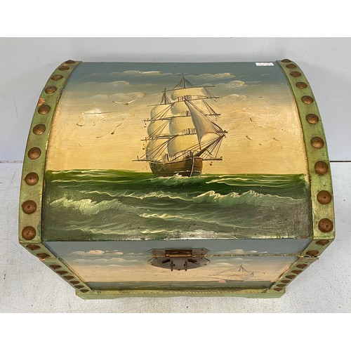 494 - A dome-top wooden chest painted to the top and front with a ship in full sail