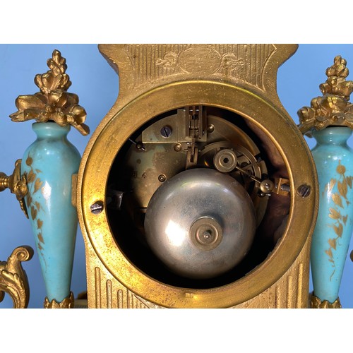 231 - A 19th century French gilt-metal and porcelain mantel clock, the round turquoise enamel dial with bl... 